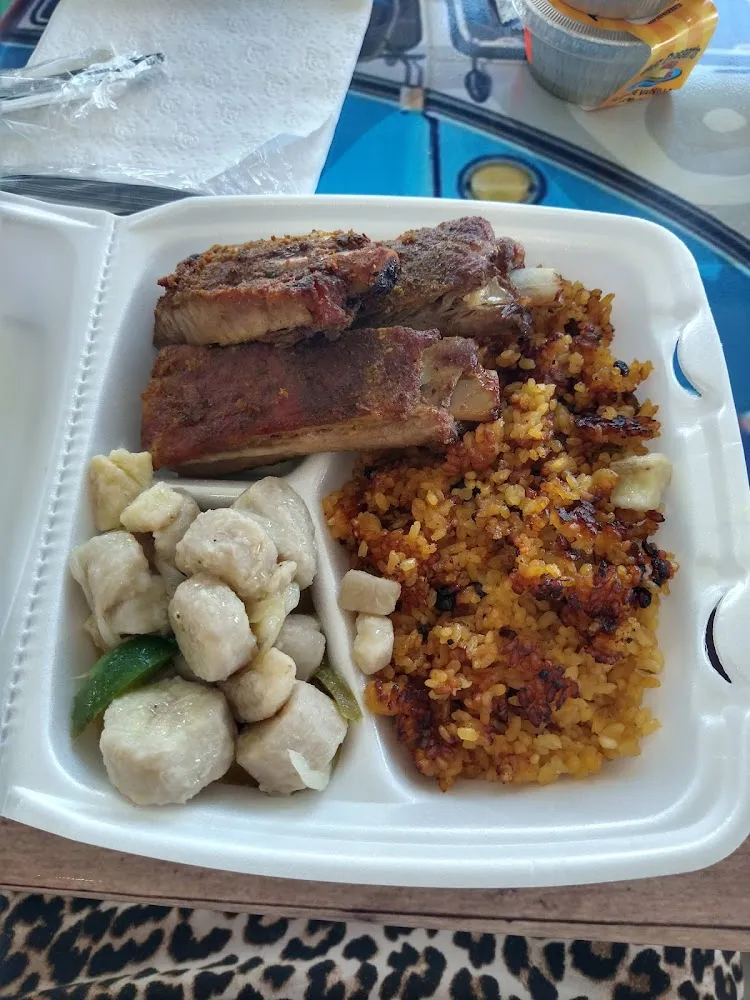 Arroz Con Gaduales Costilla De Puerco Y Guineos En Escabeche
